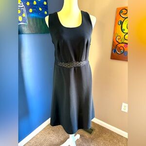 Michael K.& Co sleeveless black dress open work lace at the waist. Size 16.